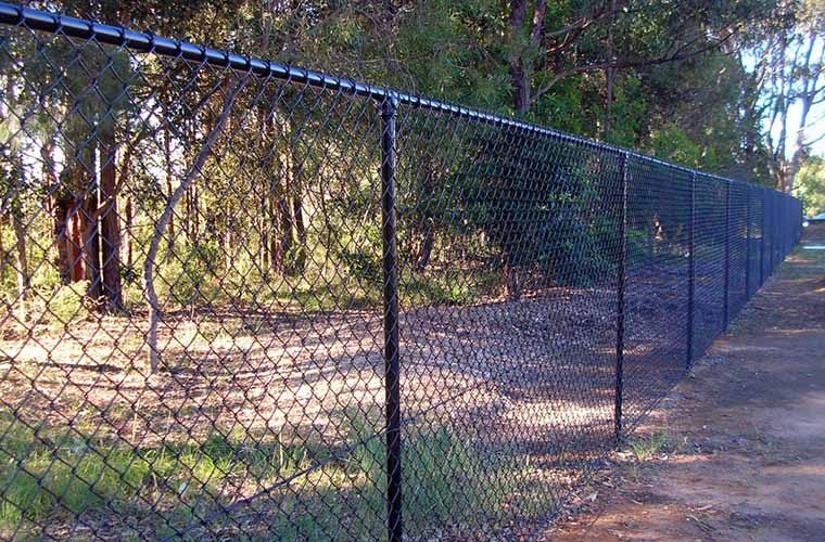 Black Chainwire Property Fence — Providing Steel & Mesh in Wagga Wagga, NSW